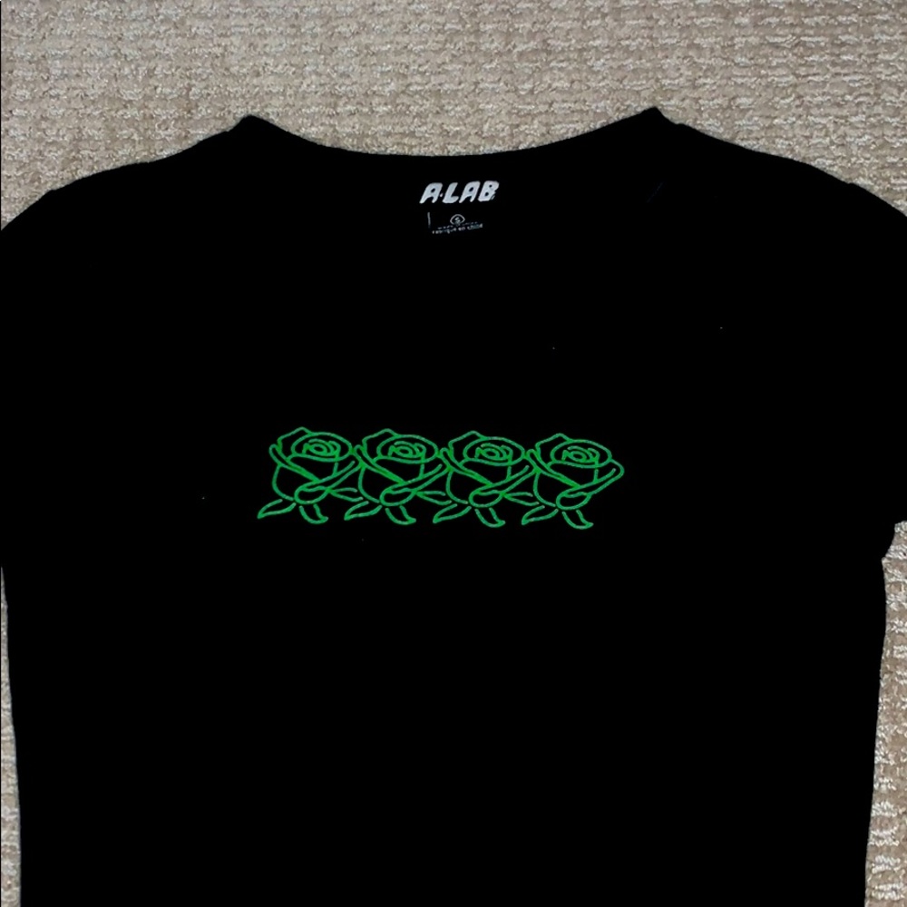 a black similes crop top